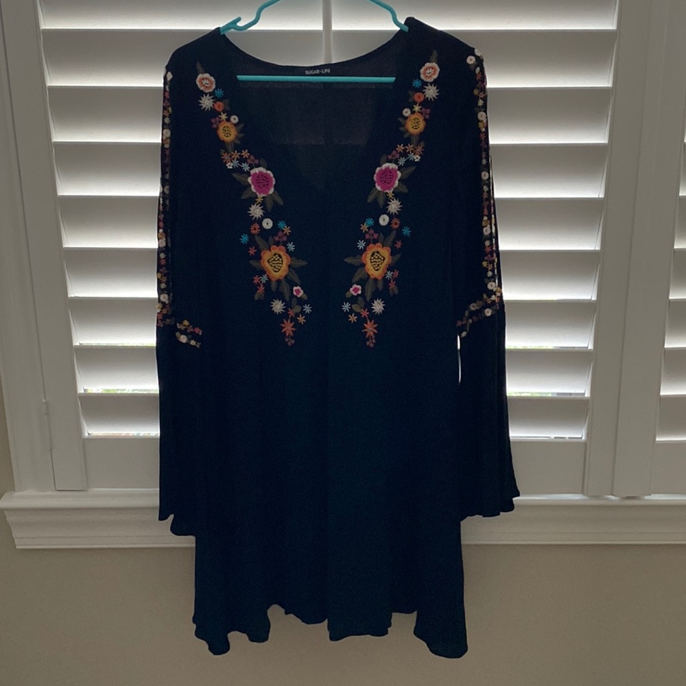 Black VNeck dress with beautiful embroidery